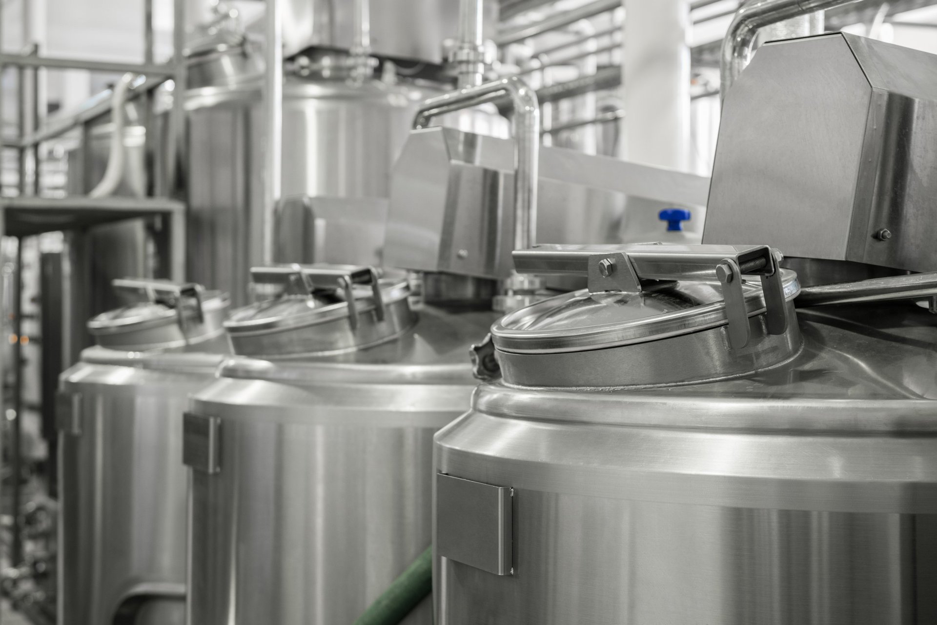 storage and pasteurization tank at the milk factory. equipment at the dairy plant