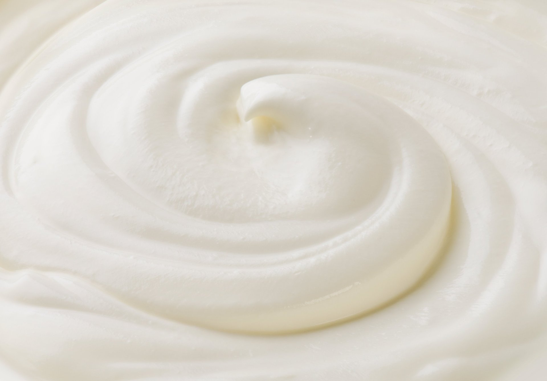 Creamy swirl of natural yogurt