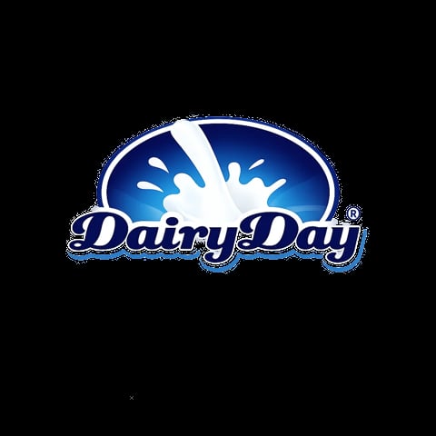 Dairy Day logo featuring a white milk splash on a blue background with stylized script text